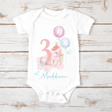 Whimsical unicorn girl's birthday t-shirt personalised with name and age